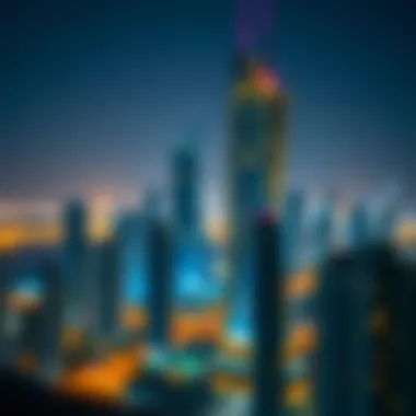 Night view of 23 Marina Tower illuminating Dubai's skyline