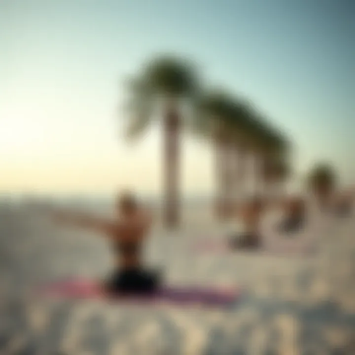 A serene beach yoga session with a backdrop of palm trees at JBR.