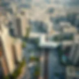 Aerial view of a metro station surrounded by residential buildings in Dubai